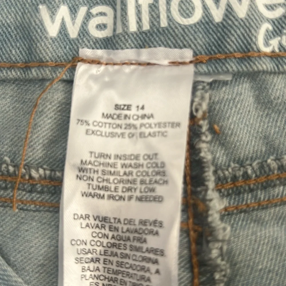 JEAN shorts. Light washed. Distressed. (14). NWOT. Snap closure
